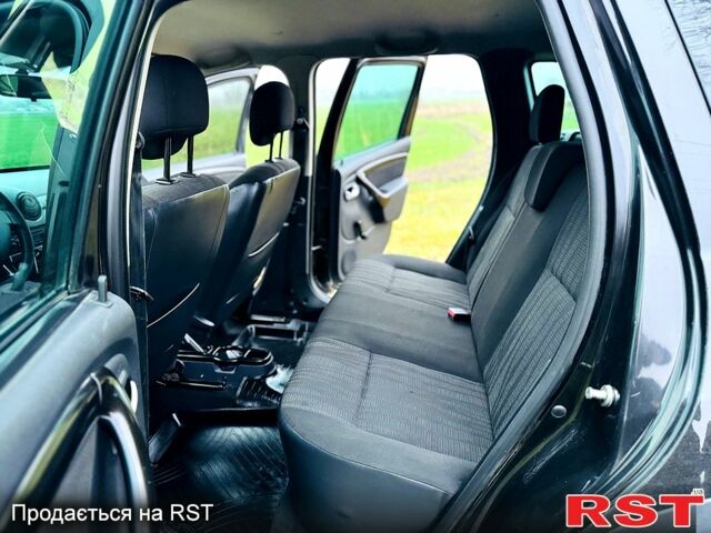 Черный Рено Дастер, объемом двигателя 1.5 л и пробегом 73 тыс. км за 12300 $, фото 10 на Automoto.ua