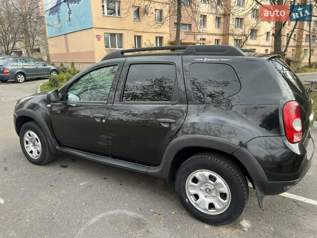 Черный Рено Дастер, объемом двигателя 1.46 л и пробегом 198 тыс. км за 7999 $, фото 1 на Automoto.ua