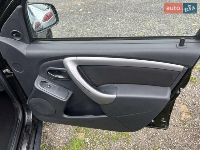 Черный Рено Дастер, объемом двигателя 1.46 л и пробегом 198 тыс. км за 7999 $, фото 17 на Automoto.ua
