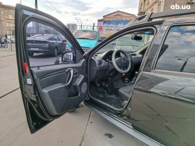 Черный Рено Дастер, объемом двигателя 1.5 л и пробегом 85 тыс. км за 12690 $, фото 13 на Automoto.ua