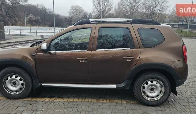 Коричневый Рено Дастер, объемом двигателя 1.6 л и пробегом 213 тыс. км за 11000 $, фото 3 на Automoto.ua