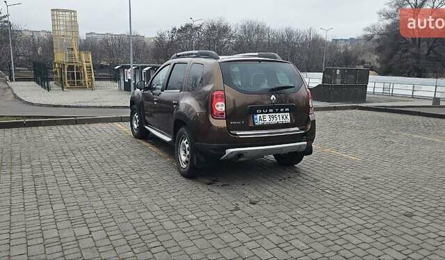 Коричневый Рено Дастер, объемом двигателя 1.6 л и пробегом 213 тыс. км за 11000 $, фото 1 на Automoto.ua