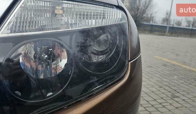 Коричневый Рено Дастер, объемом двигателя 1.6 л и пробегом 213 тыс. км за 11000 $, фото 4 на Automoto.ua