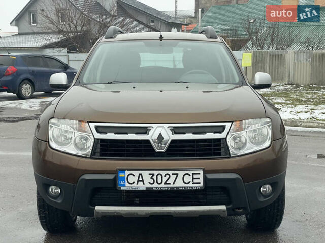 Коричневый Рено Дастер, объемом двигателя 1.6 л и пробегом 113 тыс. км за 9850 $, фото 2 на Automoto.ua