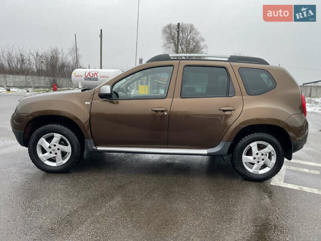 Коричневый Рено Дастер, объемом двигателя 1.6 л и пробегом 113 тыс. км за 9850 $, фото 5 на Automoto.ua