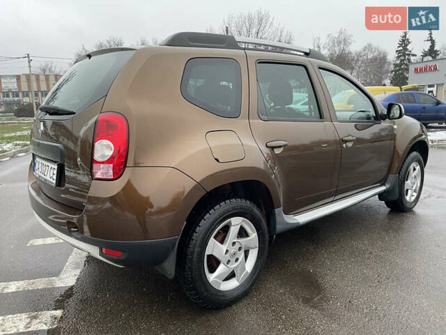 Коричневый Рено Дастер, объемом двигателя 1.6 л и пробегом 113 тыс. км за 9850 $, фото 16 на Automoto.ua