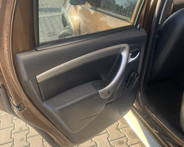 Коричневый Рено Дастер, объемом двигателя 1.46 л и пробегом 230 тыс. км за 8100 $, фото 7 на Automoto.ua