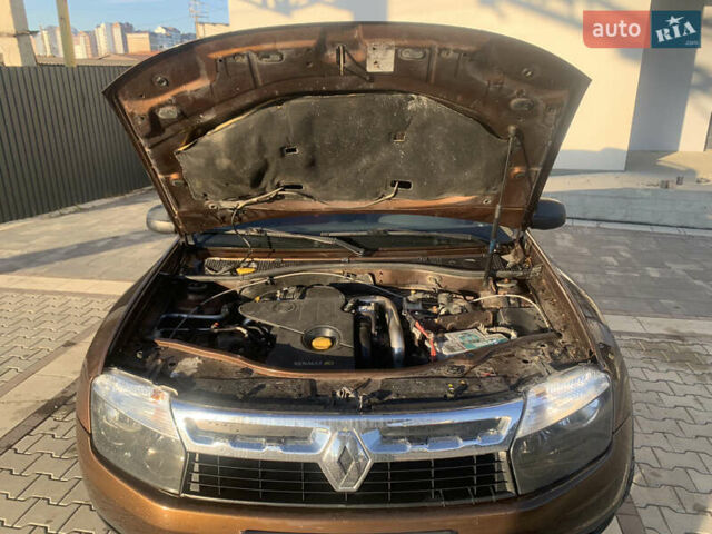 Коричневый Рено Дастер, объемом двигателя 1.46 л и пробегом 230 тыс. км за 8100 $, фото 19 на Automoto.ua