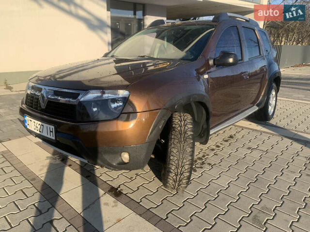 Коричневый Рено Дастер, объемом двигателя 1.46 л и пробегом 230 тыс. км за 8100 $, фото 1 на Automoto.ua