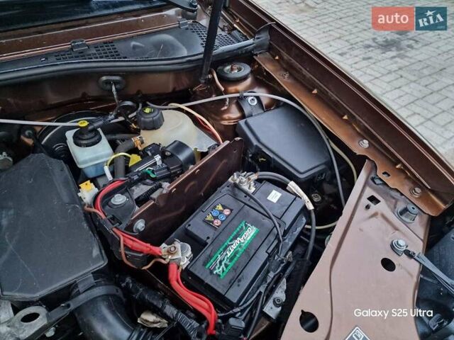 Коричневый Рено Дастер, объемом двигателя 1.6 л и пробегом 267 тыс. км за 5600 $, фото 15 на Automoto.ua