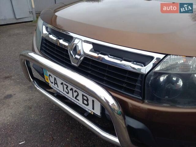 Коричневый Рено Дастер, объемом двигателя 1.46 л и пробегом 188 тыс. км за 9200 $, фото 4 на Automoto.ua
