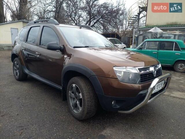 Коричневый Рено Дастер, объемом двигателя 1.46 л и пробегом 188 тыс. км за 9200 $, фото 1 на Automoto.ua