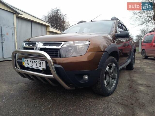 Коричневый Рено Дастер, объемом двигателя 1.46 л и пробегом 188 тыс. км за 9200 $, фото 2 на Automoto.ua