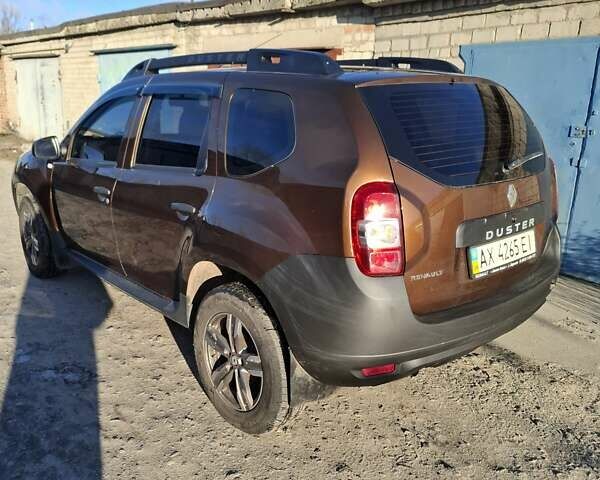 Коричневый Рено Дастер, объемом двигателя 1.45 л и пробегом 142 тыс. км за 10500 $, фото 3 на Automoto.ua