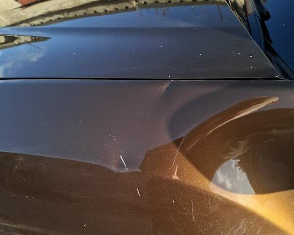 Коричневый Рено Дастер, объемом двигателя 1.45 л и пробегом 142 тыс. км за 10500 $, фото 8 на Automoto.ua