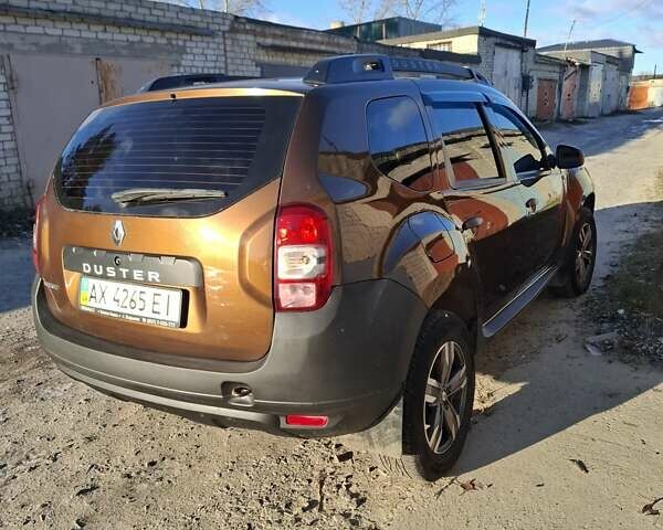 Коричневый Рено Дастер, объемом двигателя 1.45 л и пробегом 142 тыс. км за 10500 $, фото 2 на Automoto.ua