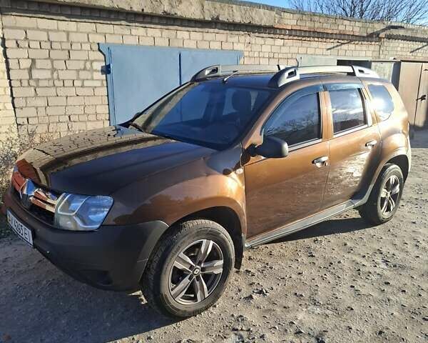 Коричневый Рено Дастер, объемом двигателя 1.45 л и пробегом 142 тыс. км за 10500 $, фото 1 на Automoto.ua