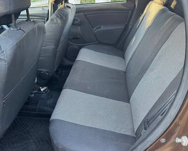 Коричневый Рено Дастер, объемом двигателя 2 л и пробегом 222 тыс. км за 8100 $, фото 6 на Automoto.ua