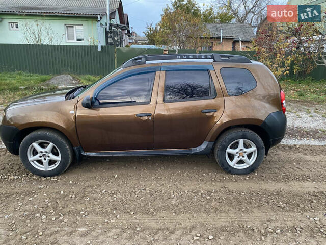 Коричневий Рено Дастер, об'ємом двигуна 1.46 л та пробігом 105 тис. км за 11100 $, фото 3 на Automoto.ua