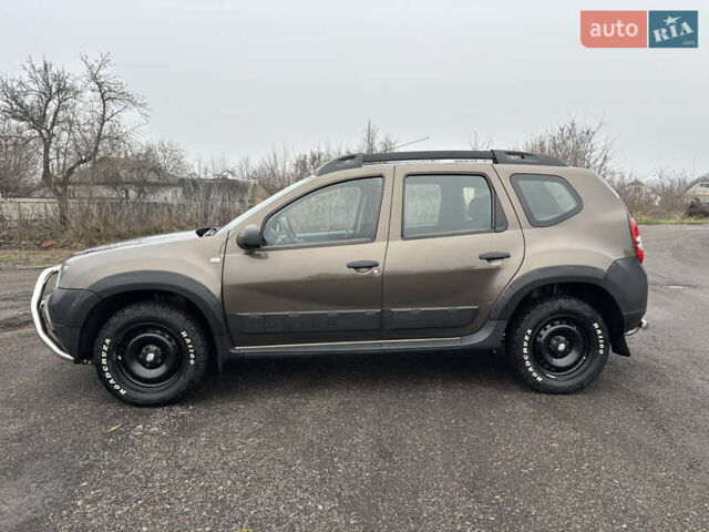 Коричневий Рено Дастер, об'ємом двигуна 1.6 л та пробігом 180 тис. км за 9999 $, фото 1 на Automoto.ua