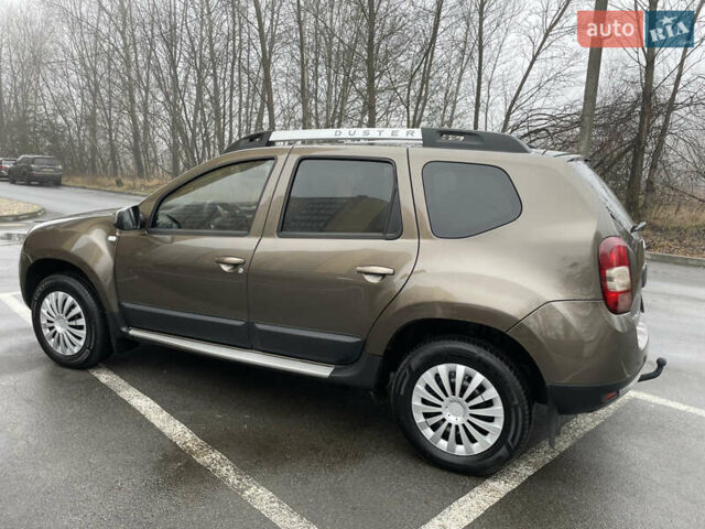 Коричневый Рено Дастер, объемом двигателя 1.46 л и пробегом 198 тыс. км за 9500 $, фото 2 на Automoto.ua