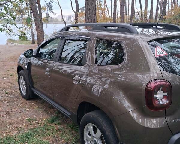 Коричневый Рено Дастер, объемом двигателя 1.6 л и пробегом 86 тыс. км за 15000 $, фото 4 на Automoto.ua