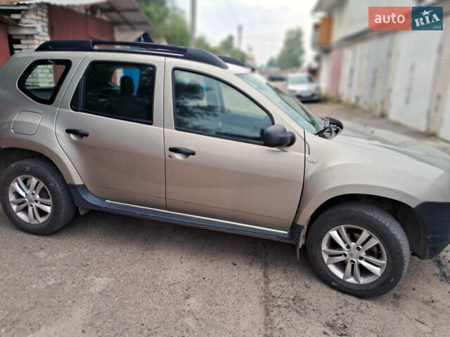 Серый Рено Дастер, объемом двигателя 1.6 л и пробегом 65 тыс. км за 10000 $, фото 2 на Automoto.ua