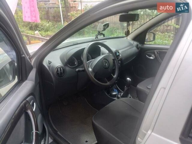 Серый Рено Дастер, объемом двигателя 1.6 л и пробегом 150 тыс. км за 9500 $, фото 3 на Automoto.ua