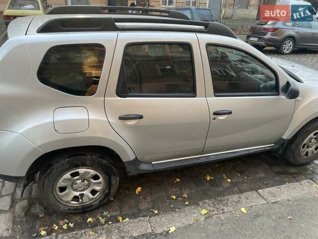 Серый Рено Дастер, объемом двигателя 1.6 л и пробегом 159 тыс. км за 8300 $, фото 2 на Automoto.ua