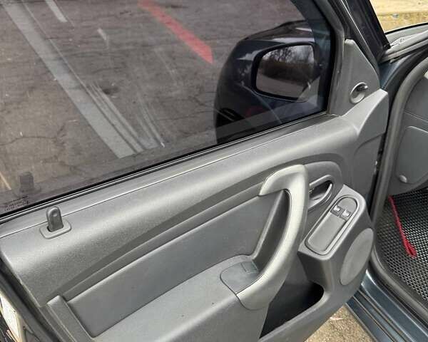 Серый Рено Дастер, объемом двигателя 1.46 л и пробегом 131 тыс. км за 12500 $, фото 5 на Automoto.ua