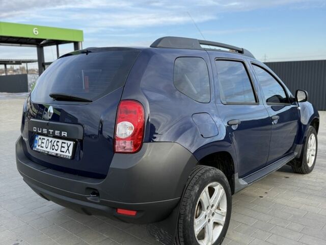 Синий Рено Дастер, объемом двигателя 1.6 л и пробегом 158 тыс. км за 7500 $, фото 2 на Automoto.ua