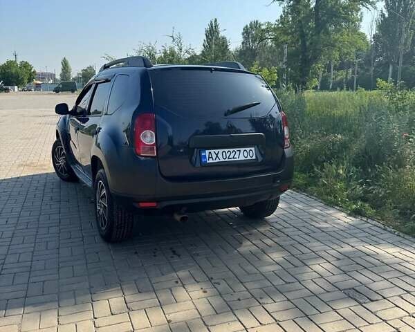 Синий Рено Дастер, объемом двигателя 1.6 л и пробегом 180 тыс. км за 6200 $, фото 2 на Automoto.ua