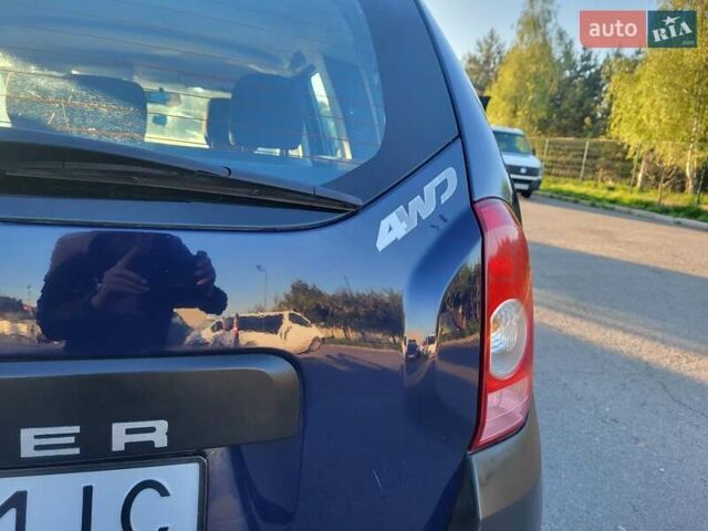 Синий Рено Дастер, объемом двигателя 1.6 л и пробегом 184 тыс. км за 9400 $, фото 78 на Automoto.ua