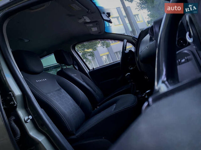 Зеленый Рено Дастер, объемом двигателя 1.46 л и пробегом 188 тыс. км за 11500 $, фото 13 на Automoto.ua