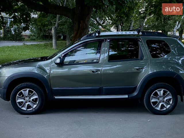 Зеленый Рено Дастер, объемом двигателя 1.46 л и пробегом 188 тыс. км за 11500 $, фото 4 на Automoto.ua