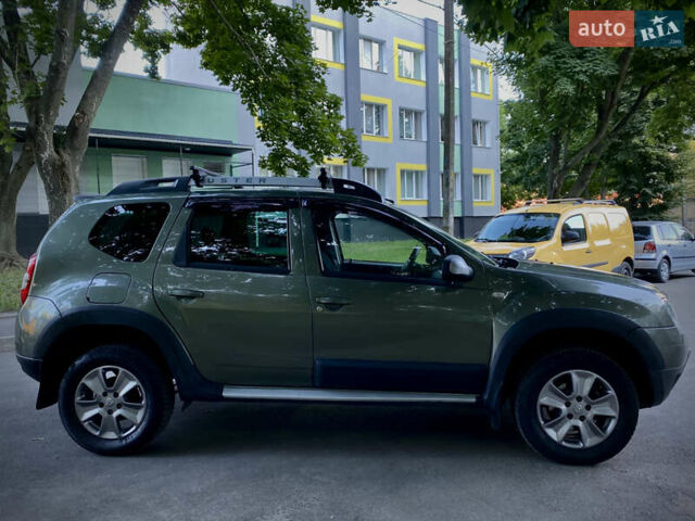 Зеленый Рено Дастер, объемом двигателя 1.46 л и пробегом 188 тыс. км за 11500 $, фото 7 на Automoto.ua