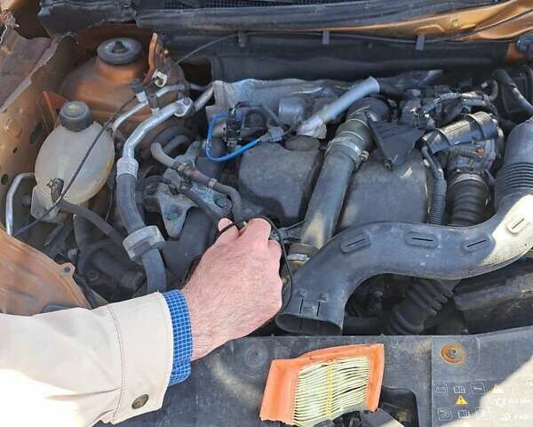 Оранжевый Рено Дастер, объемом двигателя 1.46 л и пробегом 98 тыс. км за 15000 $, фото 3 на Automoto.ua