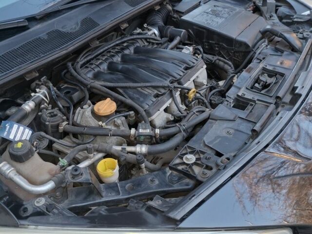 Черный Рено Флюенс, объемом двигателя 2 л и пробегом 170 тыс. км за 6226 $, фото 5 на Automoto.ua