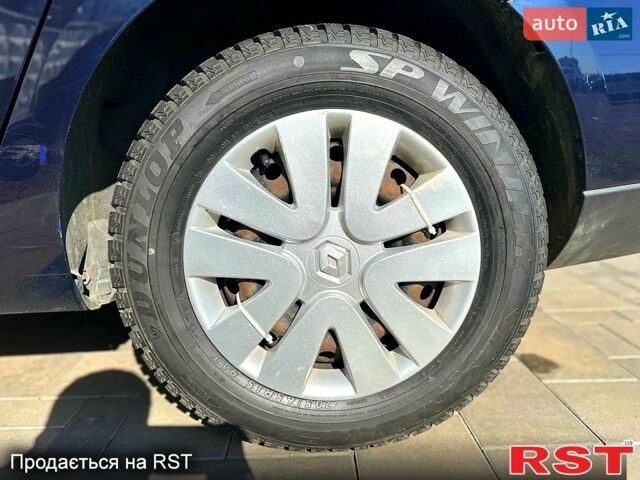 Синий Рено Флюенс, объемом двигателя 1.5 л и пробегом 190 тыс. км за 5800 $, фото 6 на Automoto.ua