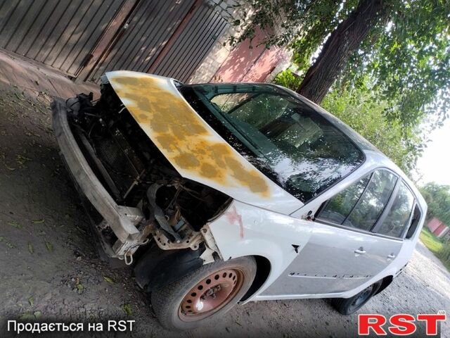 Белый Рено Гранд Сценик, объемом двигателя 1.9 л и пробегом 342 тыс. км за 2950 $, фото 1 на Automoto.ua