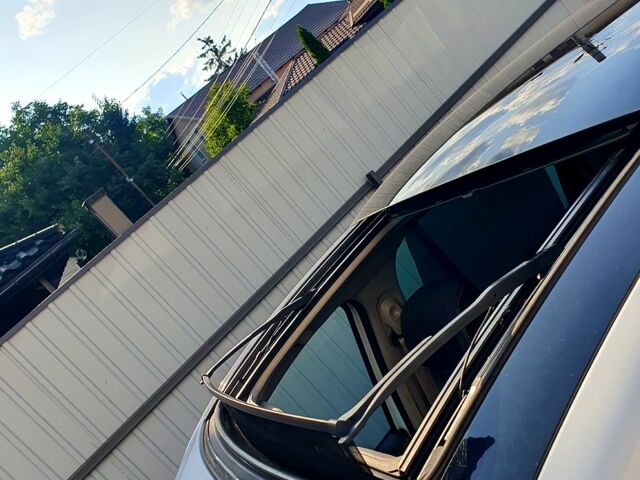 Белый Рено Гранд Сценик, объемом двигателя 1.6 л и пробегом 290 тыс. км за 8000 $, фото 2 на Automoto.ua