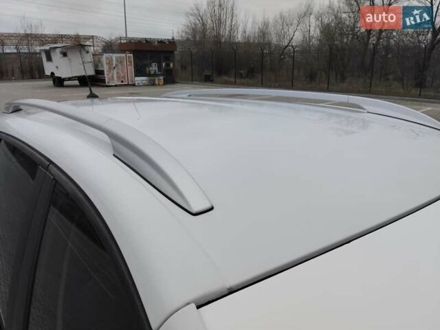 Рено Гранд Сценик 2014 в Новомосковске на Automoto.ua Белый Рено Гранд Сценик, объемом двигателя 1.5 л и пробегом 146 тыс. км за 10800 $, фото 3 на Automoto.ua