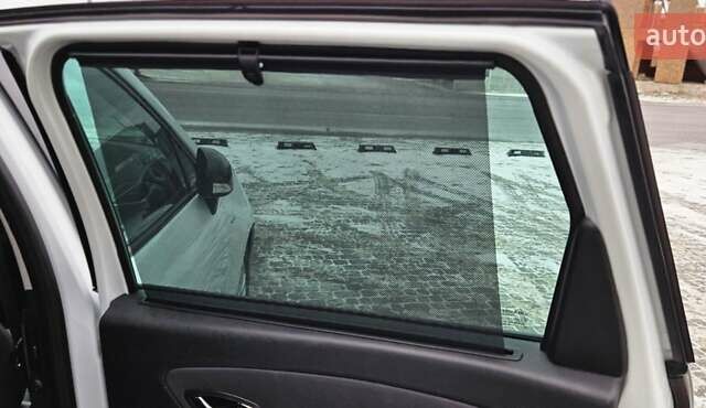 Білий Рено Гранд Сценік, об'ємом двигуна 1.5 л та пробігом 211 тис. км за 9950 $, фото 25 на Automoto.ua