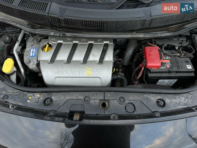 Черный Рено Гранд Сценик, объемом двигателя 2 л и пробегом 211 тыс. км за 5600 $, фото 50 на Automoto.ua
