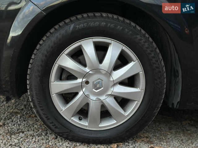 Черный Рено Гранд Сценик, объемом двигателя 2 л и пробегом 211 тыс. км за 5600 $, фото 48 на Automoto.ua