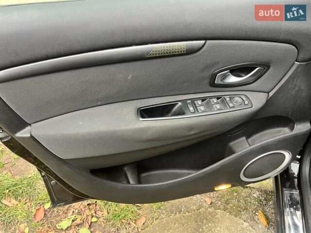 Рено Гранд Сценик 2009 в Луцке на Automoto.ua Черный Рено Гранд Сценик, объемом двигателя 1.4 л и пробегом 181 тыс. км за 6100 $, фото 10 на Automoto.ua