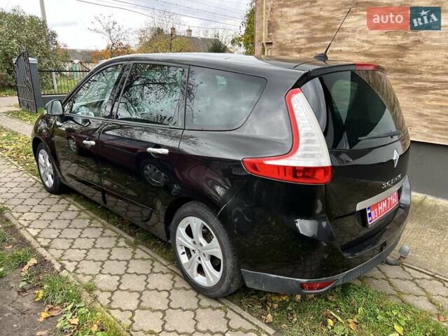 Рено Гранд Сценик 2009 в Луцке на Automoto.ua Черный Рено Гранд Сценик, объемом двигателя 1.4 л и пробегом 181 тыс. км за 6100 $, фото 31 на Automoto.ua