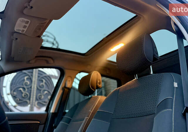 Черный Рено Гранд Сценик, объемом двигателя 1.4 л и пробегом 183 тыс. км за 7500 $, фото 5 на Automoto.ua