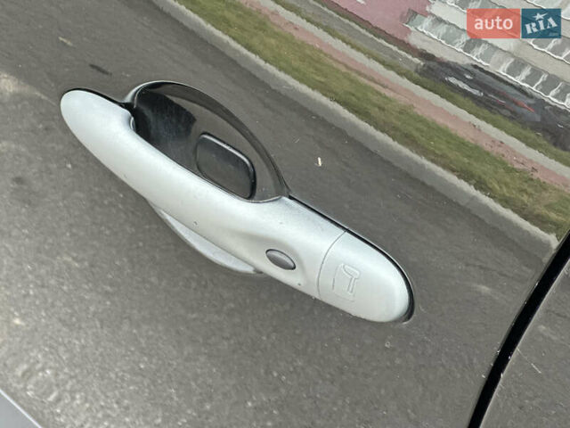 Черный Рено Гранд Сценик, объемом двигателя 1.9 л и пробегом 253 тыс. км за 7999 $, фото 13 на Automoto.ua