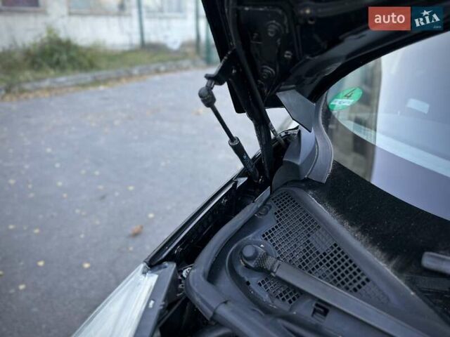 Черный Рено Гранд Сценик, объемом двигателя 1.6 л и пробегом 254 тыс. км за 10500 $, фото 68 на Automoto.ua